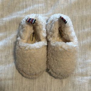 White toddler size slippers 9-10, run closer to a 9